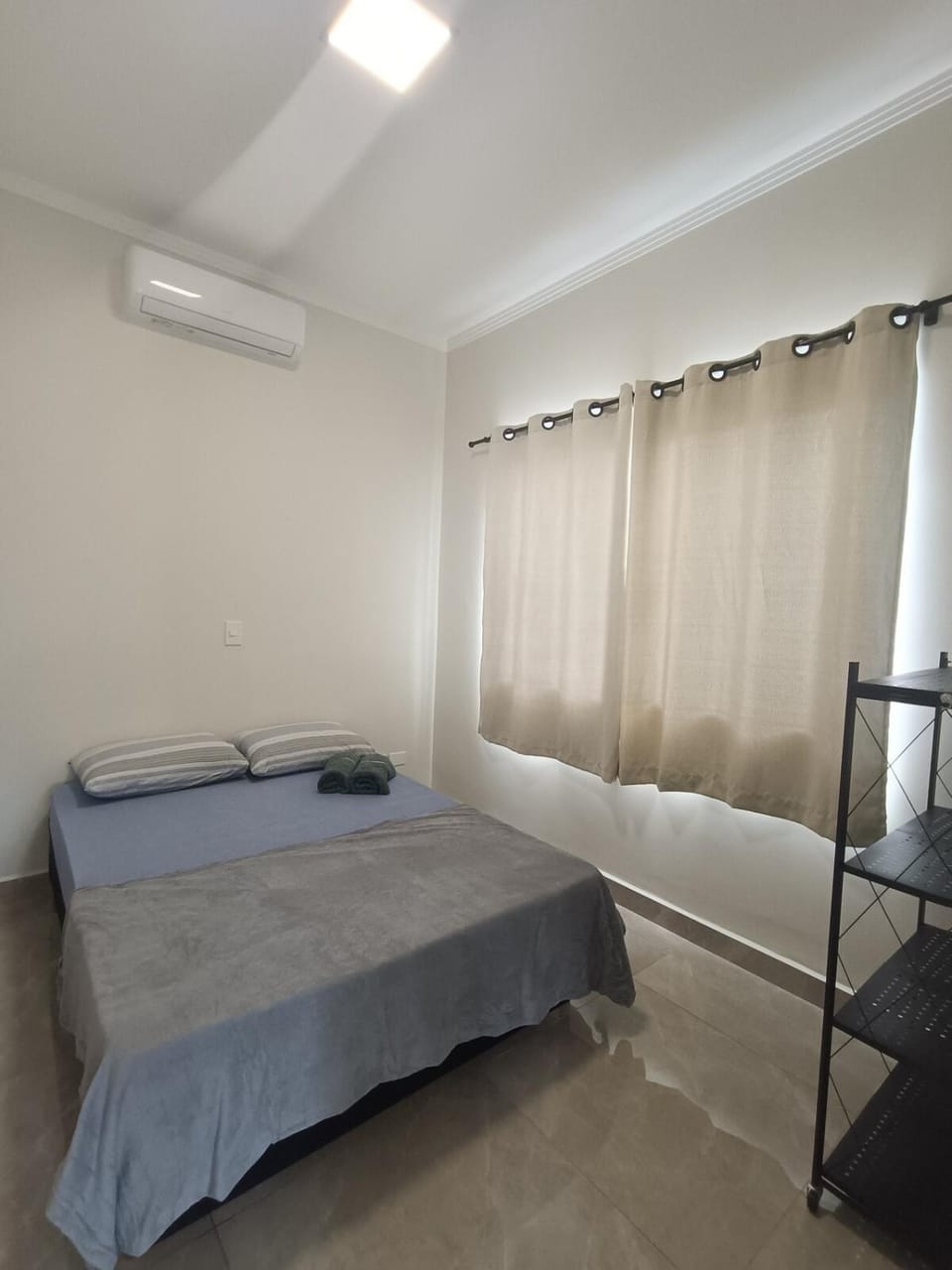 Photo of the whole room, air conditioner
