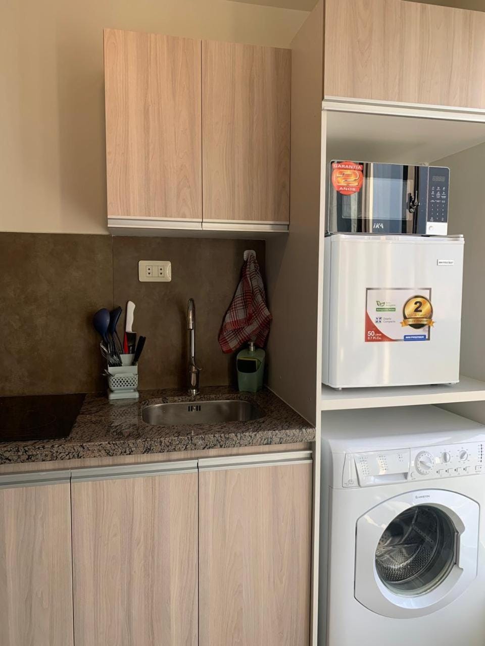 Kitchen or kitchenette, washing machine