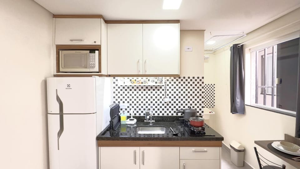 Kitchen or kitchenette, stove, toaster