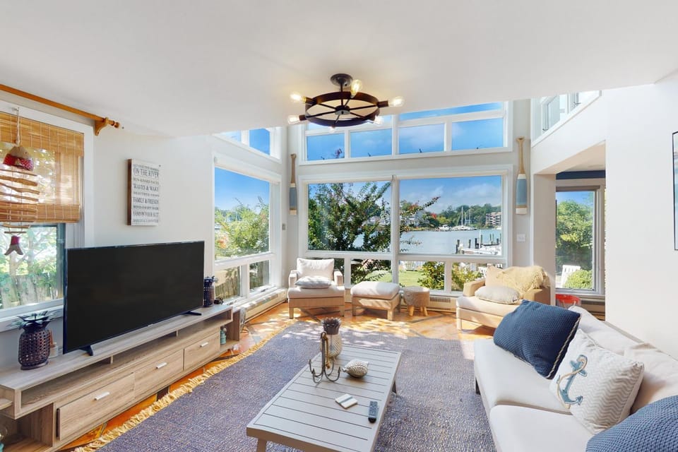 Dog-friendly riverfront home with dock, 2 balconies, waterside patio, & grill Vacation rental in Spa Creek