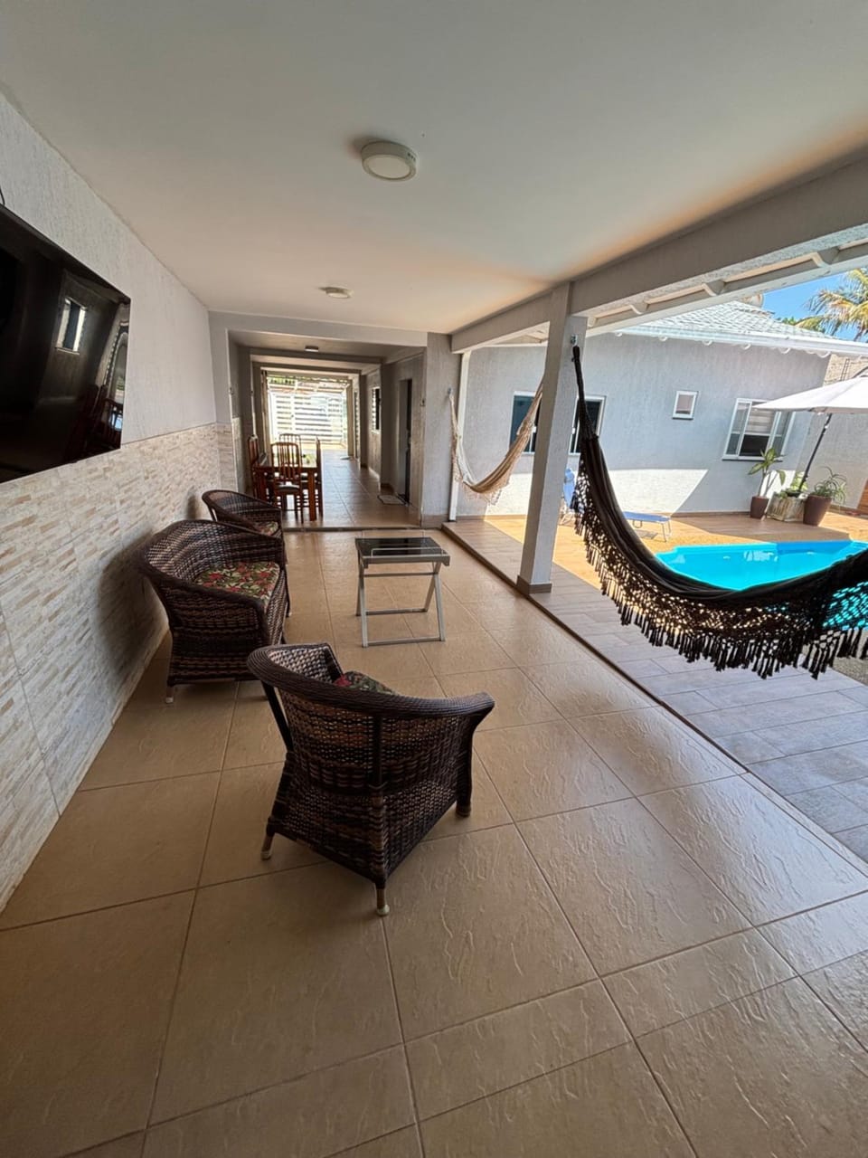 Communal lounge/ TV room, TV and multimedia, Pool view, Swimming pool