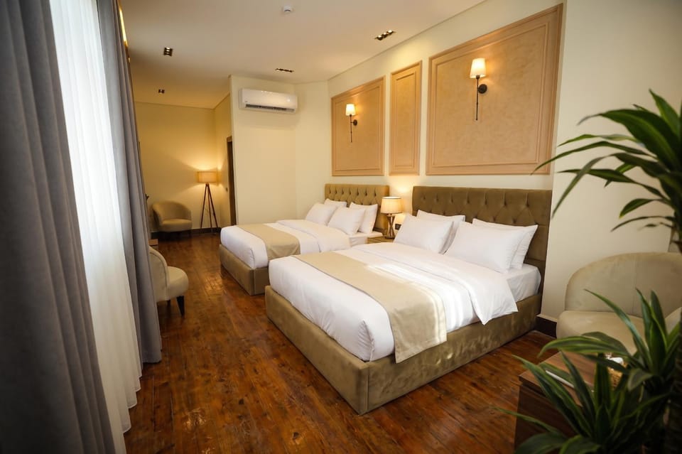 Bed, Living room, Photo of the whole room, Seating area, Bedroom, towels, air conditioner