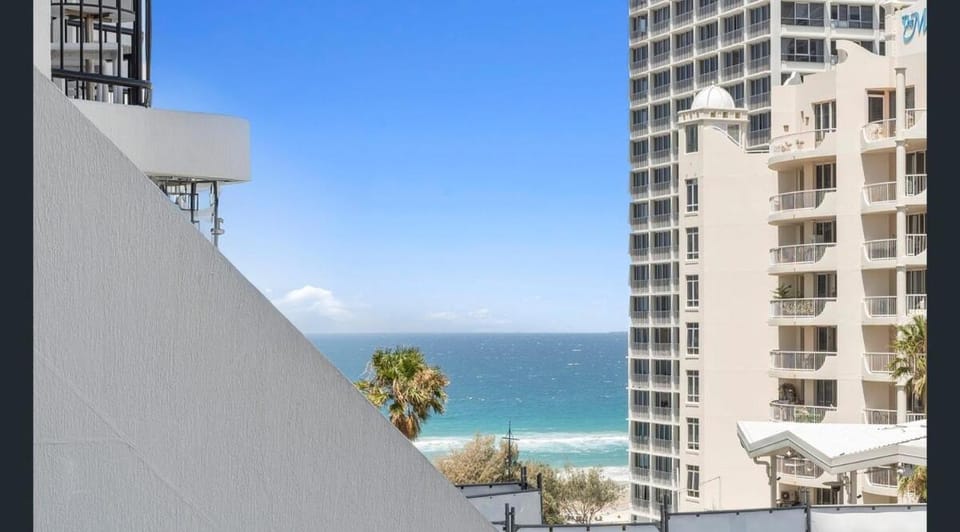 Property building, Nearby landmark, Day, Natural landscape, View (from property/room), Balcony/Terrace, Beach, City view, Sea view