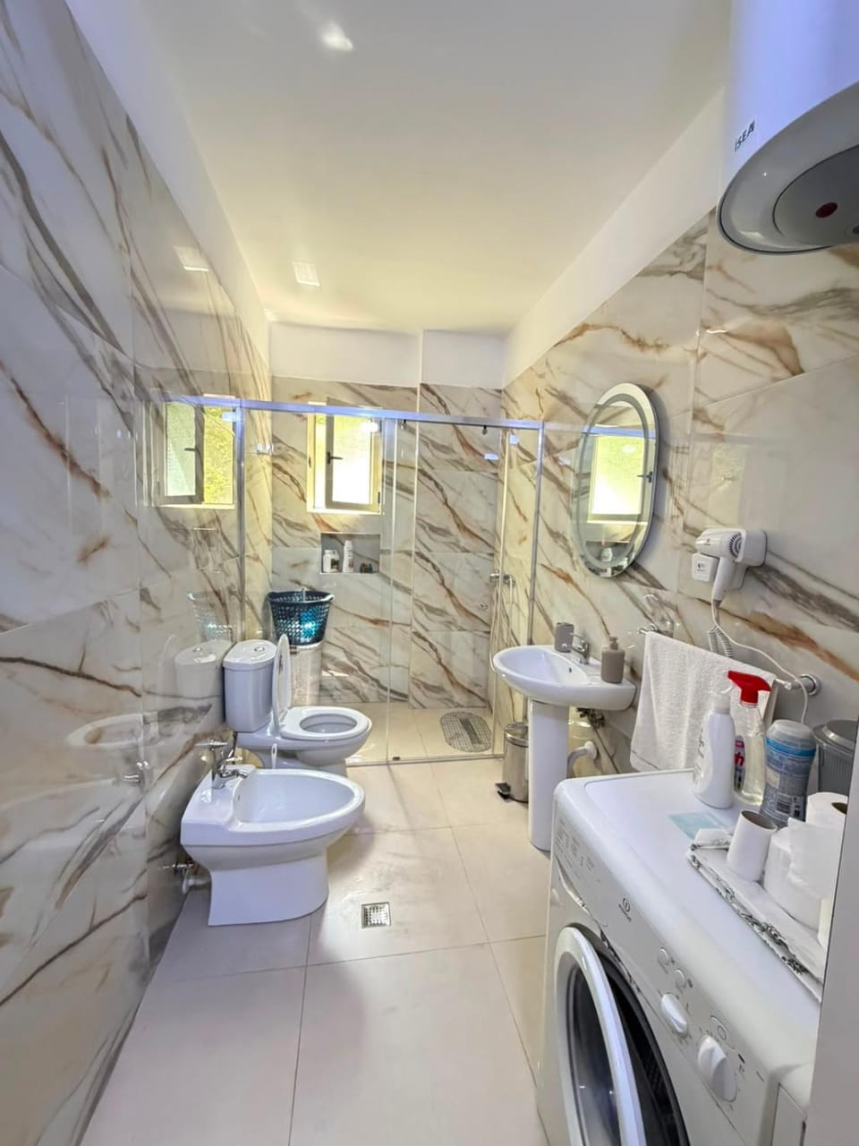 Shower, Toilet, Bathroom, bidet, towels, washing machine, dryer