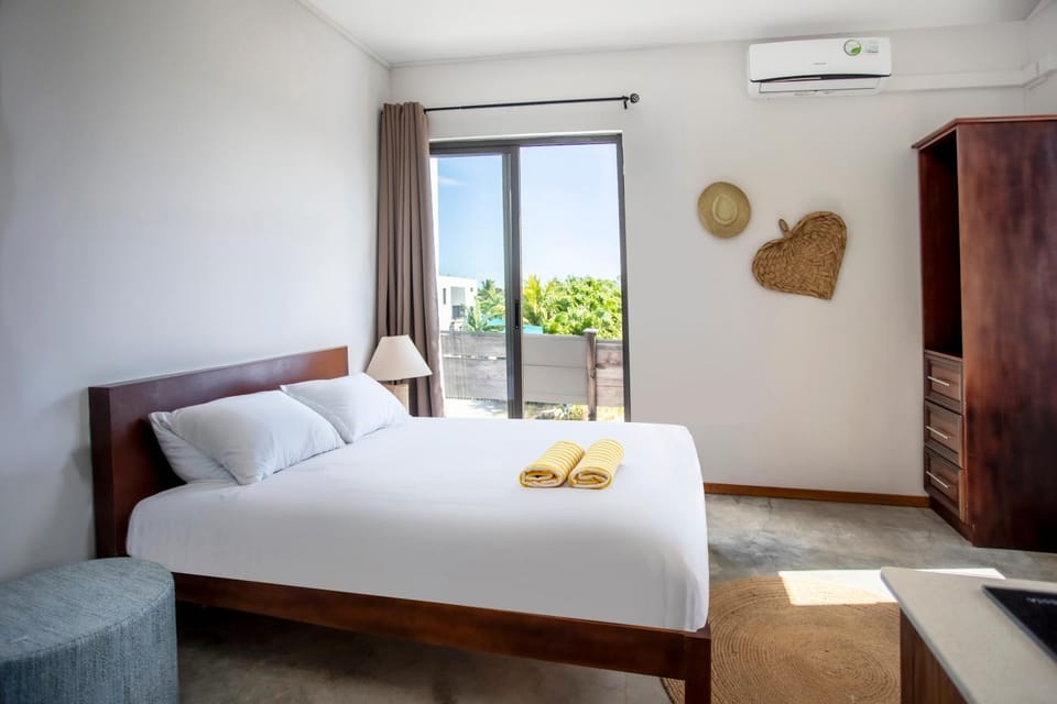 Bed, Photo of the whole room, Bedroom, towels, air conditioner