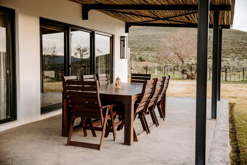 Property building, Patio, Natural landscape, View (from property/room), Seating area, Mountain view