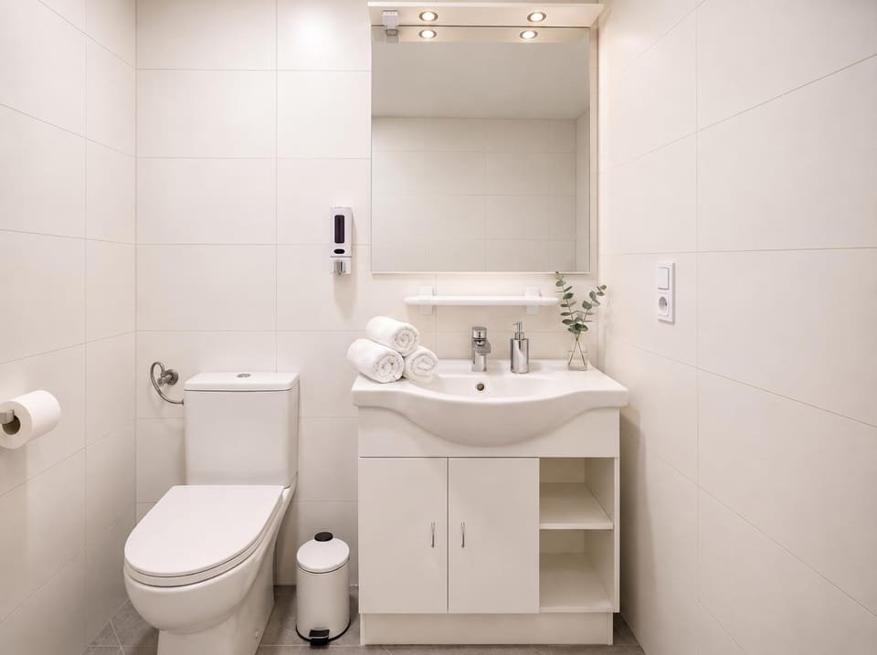 Shower, Toilet, Bathroom, hair dryier, towels, laundry