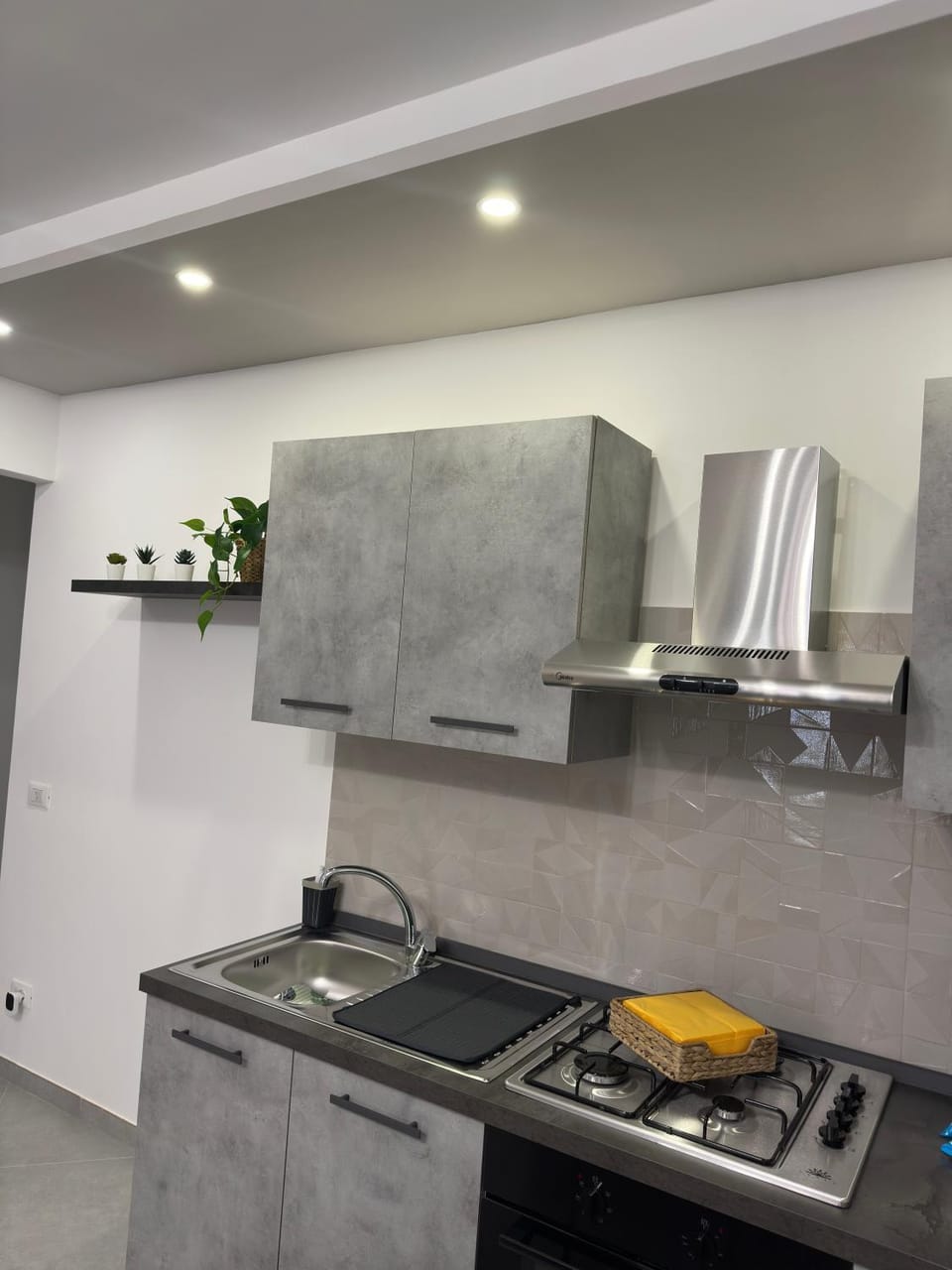 Kitchen or kitchenette, stove