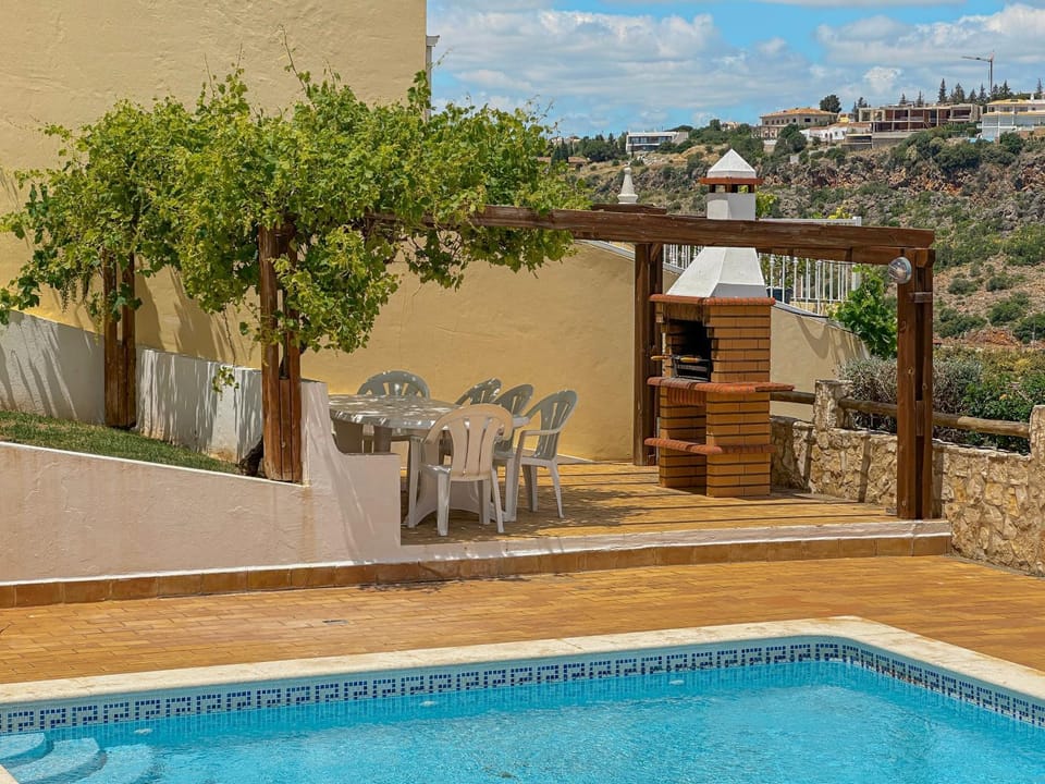 Natural landscape, View (from property/room), Swimming pool, sunbed