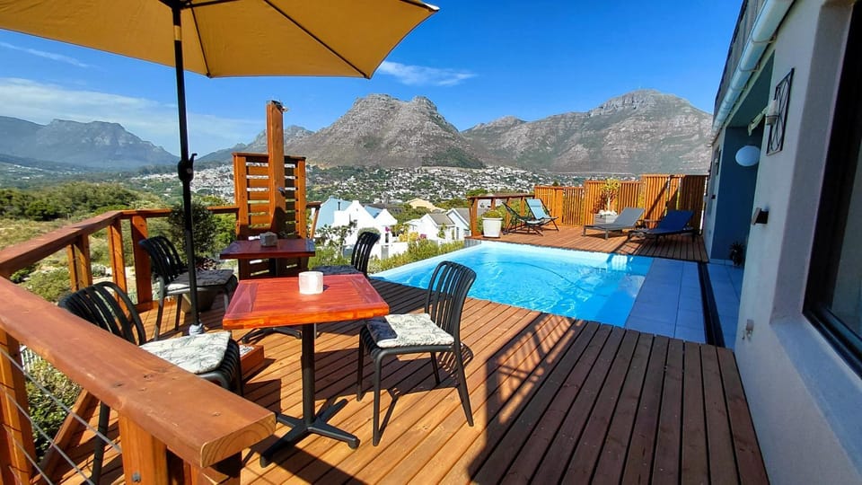 View (from property/room), Balcony/Terrace, Dining area, Mountain view, Pool view, Swimming pool