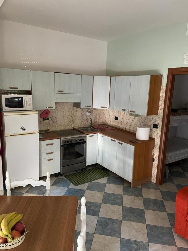 Kitchen or kitchenette, oven, stove