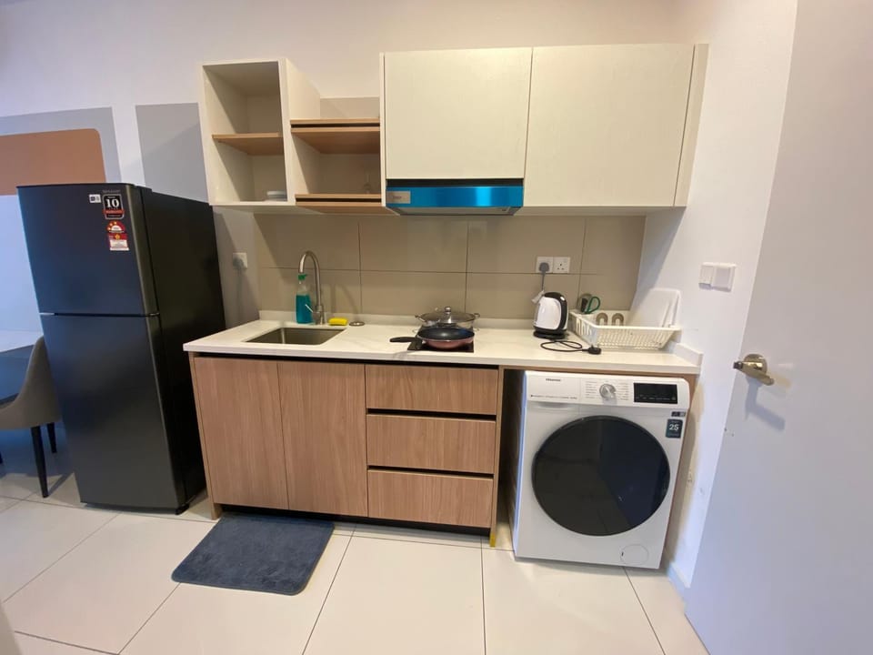 Kitchen or kitchenette, oven, stove, washing machine, dryer