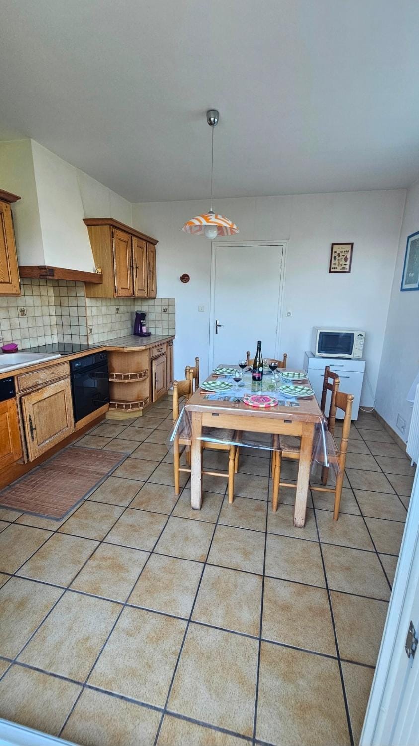 Dining area, dishwasher, oven, stove
