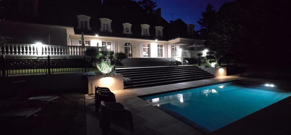 Property building, Night, Swimming pool