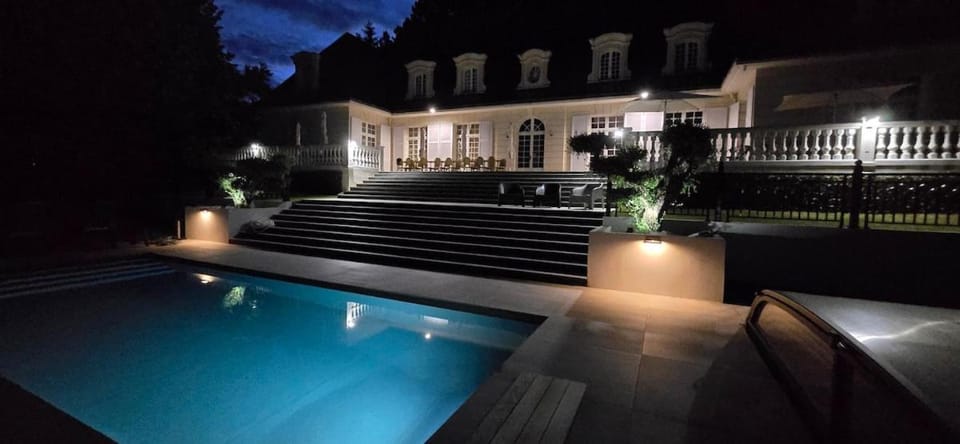 Property building, Night, Swimming pool