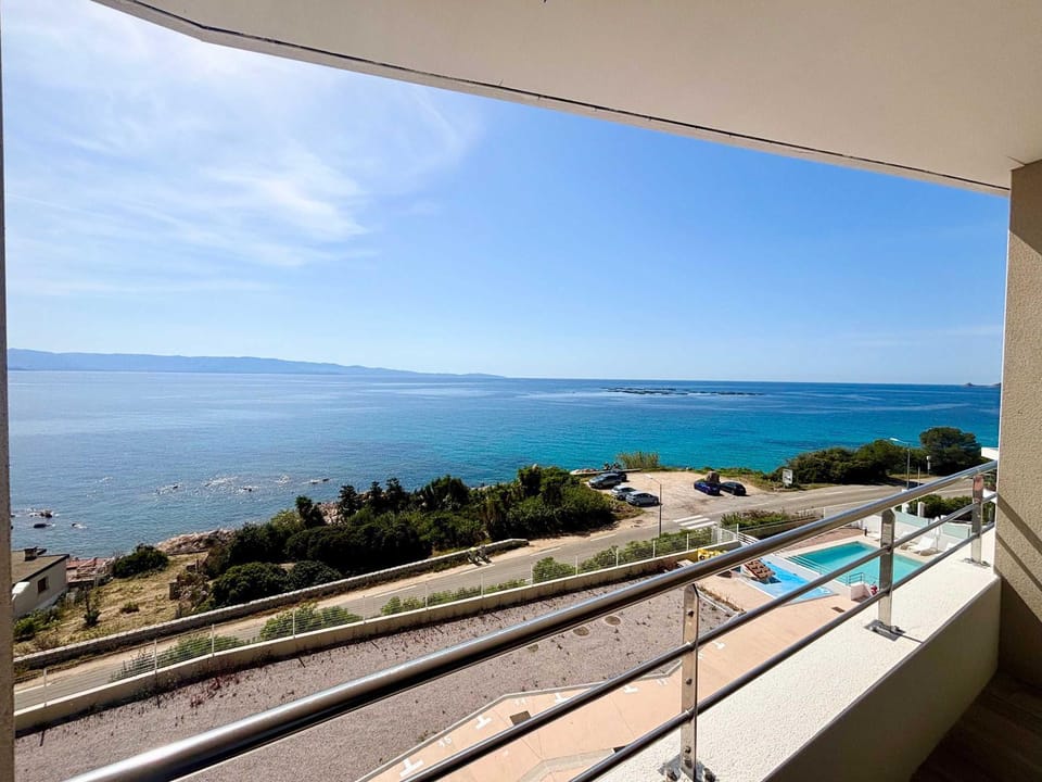 View (from property/room), Balcony/Terrace, Pool view, Sea view, Swimming pool