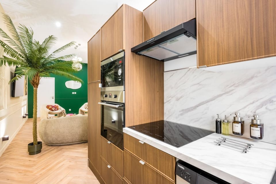 Kitchen or kitchenette, dishwasher, oven, stove