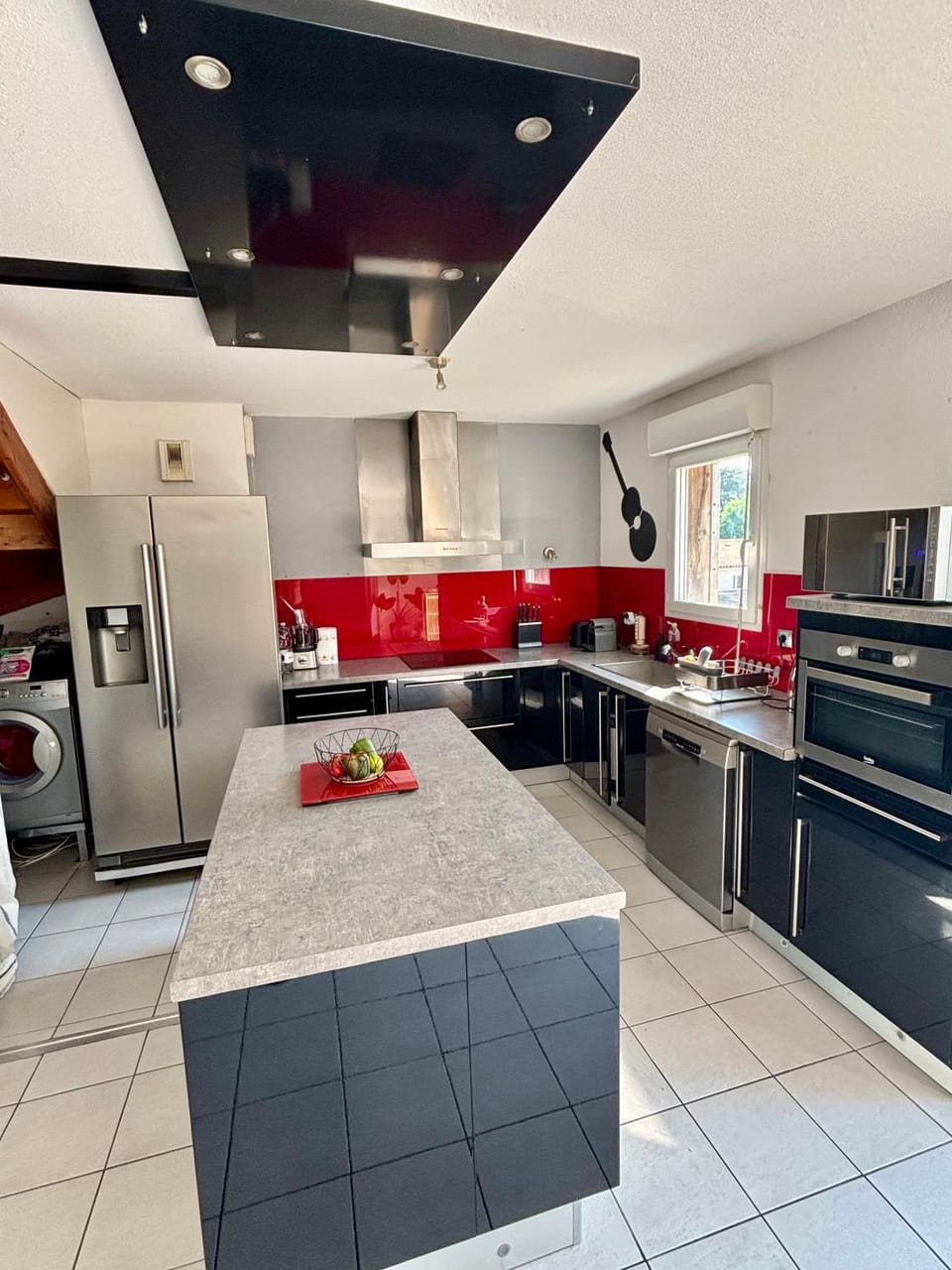 Kitchen or kitchenette, dishwasher, oven, stove