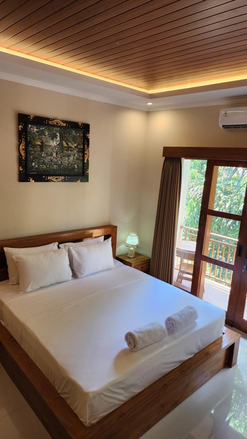 Bed, Photo of the whole room, Bedroom, towels, air conditioner