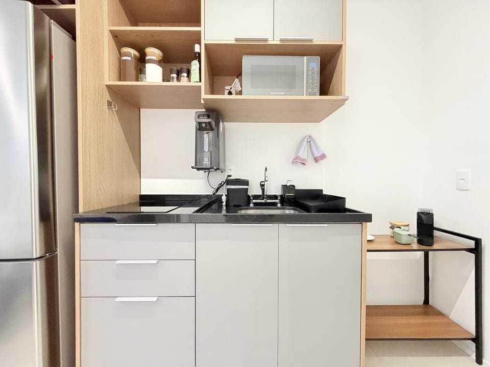 Kitchen or kitchenette, microwave, stove
