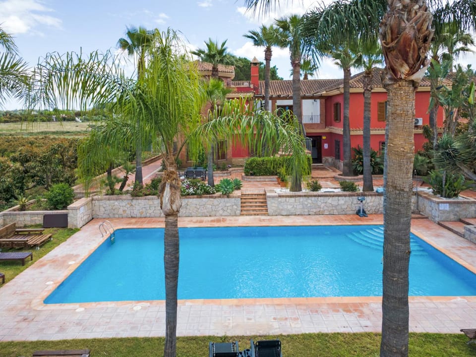 Property building, Living room, Swimming pool