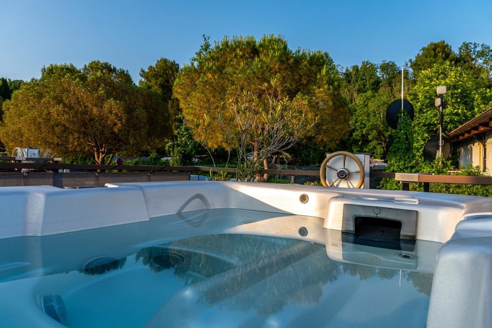 Sirena Lux Seahouse in Marina Portorož, Beachfront with Terrace and Jacuzzi Docked boat in Istria County
