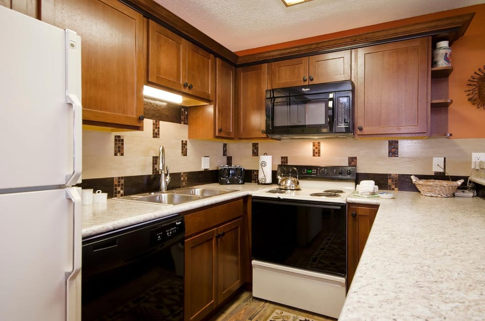 Kitchen or kitchenette, microwave, oven, stove, kitchen