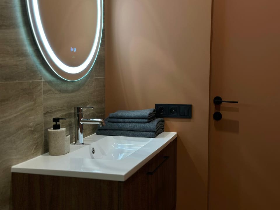 Toilet, heating, storage, towels