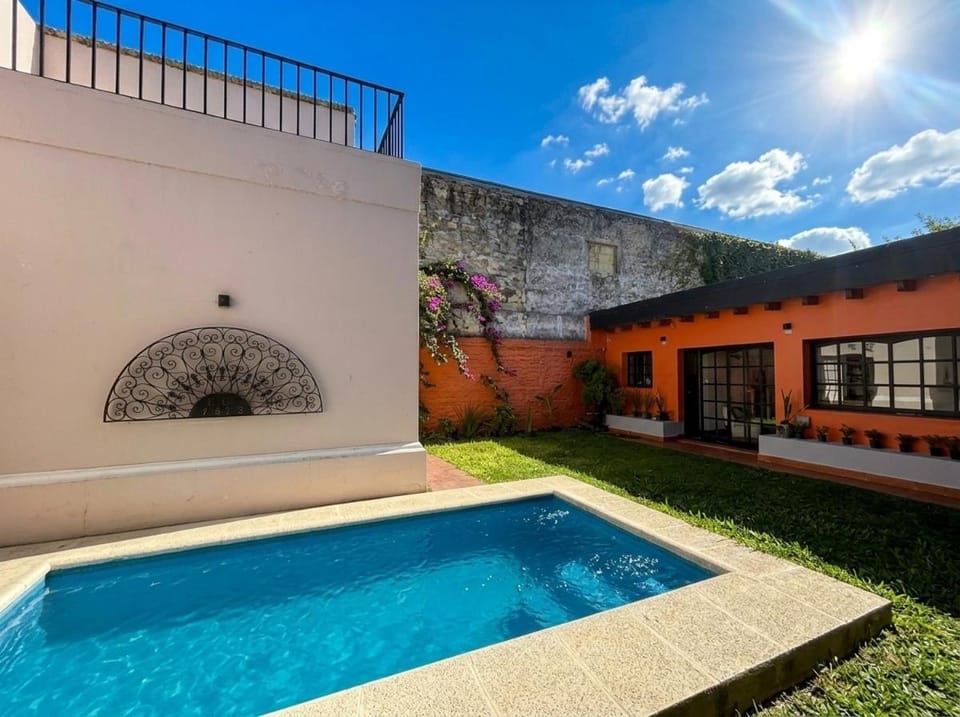 Property building, Day, Pool view, Swimming pool, sunbed