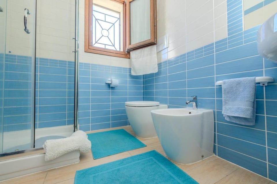 Olbia Modern Home with Veranda, AC, and Parking Apartment in Olbia