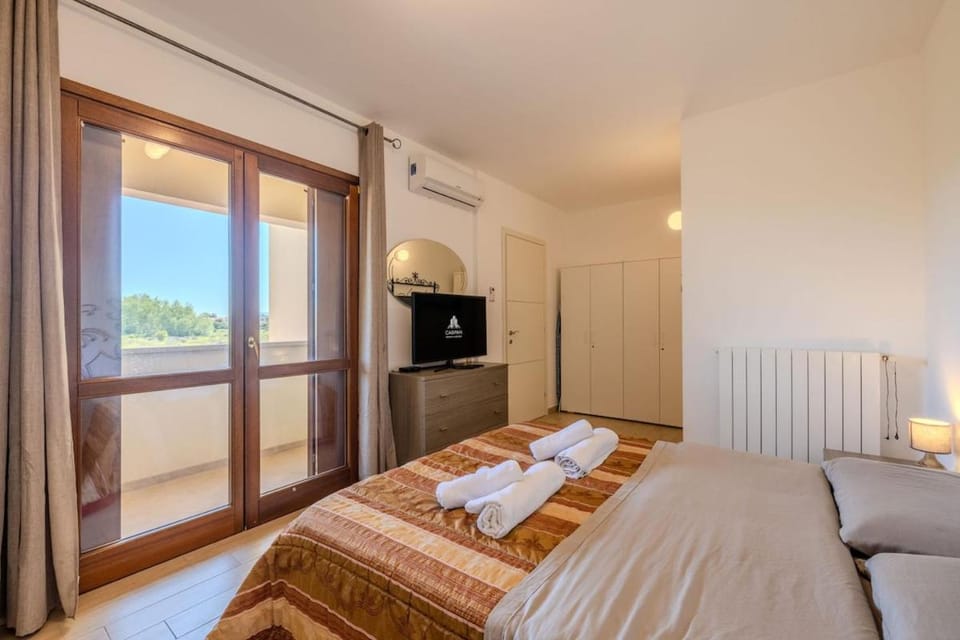 Olbia Modern Home with Veranda, AC, and Parking Apartment in Olbia