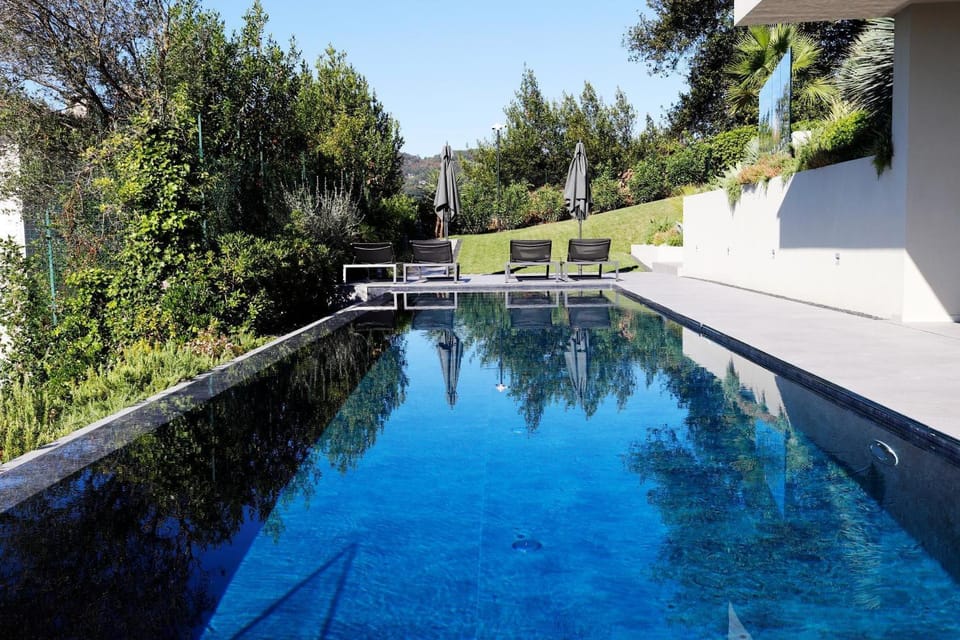 Property building, Living room, Swimming pool