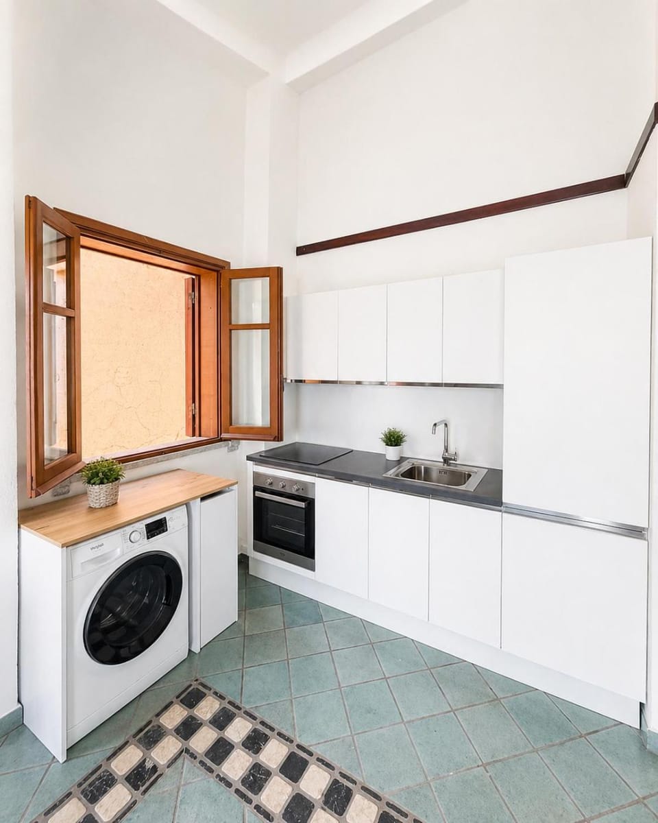 Kitchen or kitchenette, dishwasher, oven, stove, washing machine, dryer