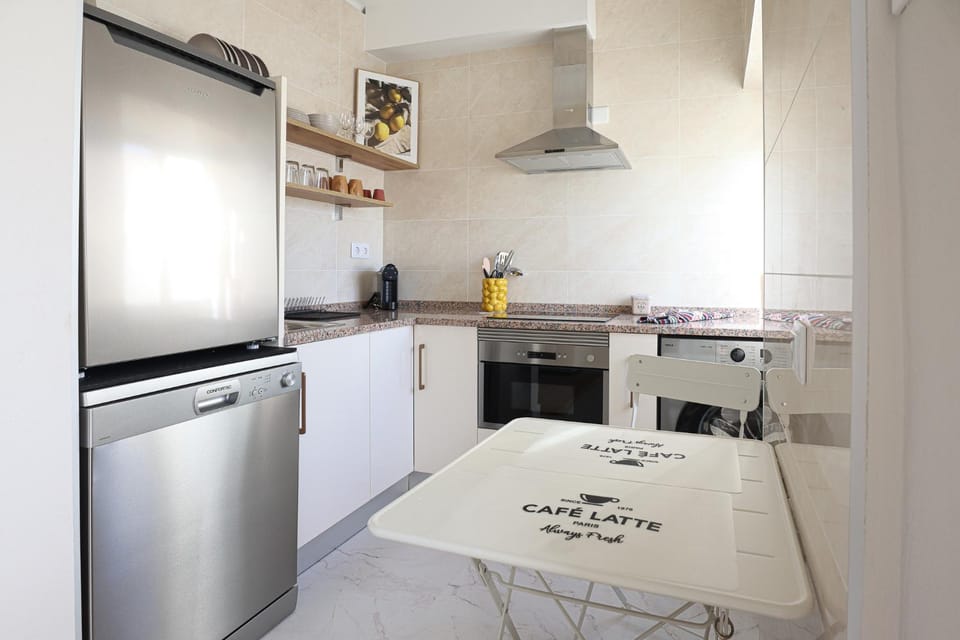 Kitchen or kitchenette, dishwasher, microwave, washing machine