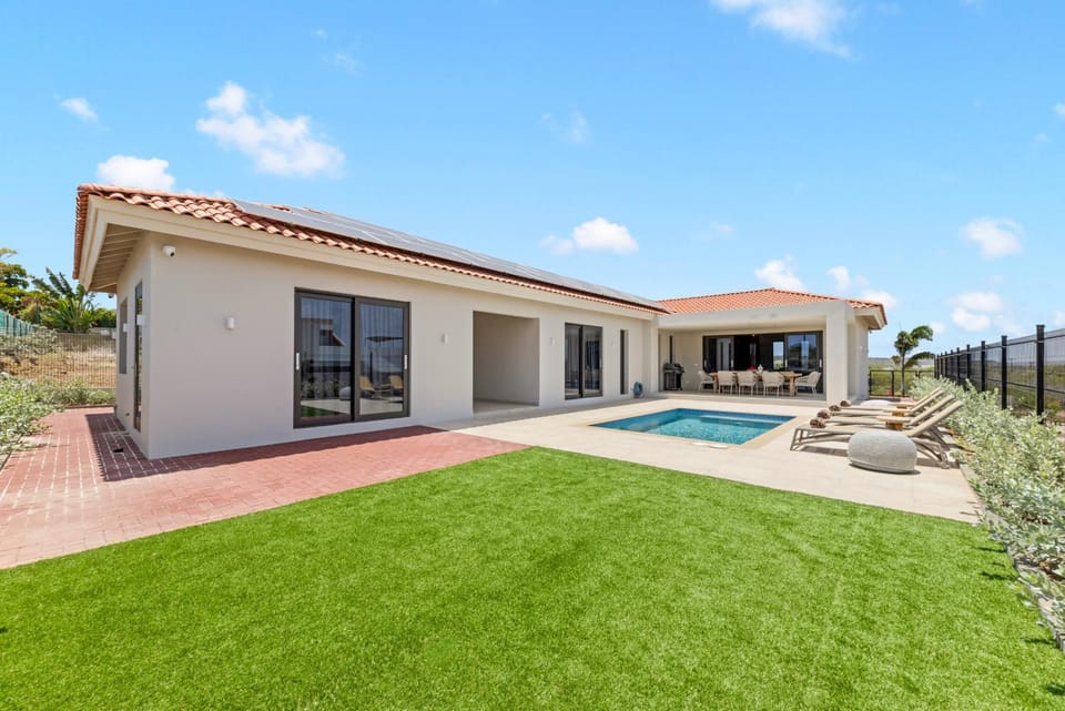 Property building, Patio, Garden, Swimming pool