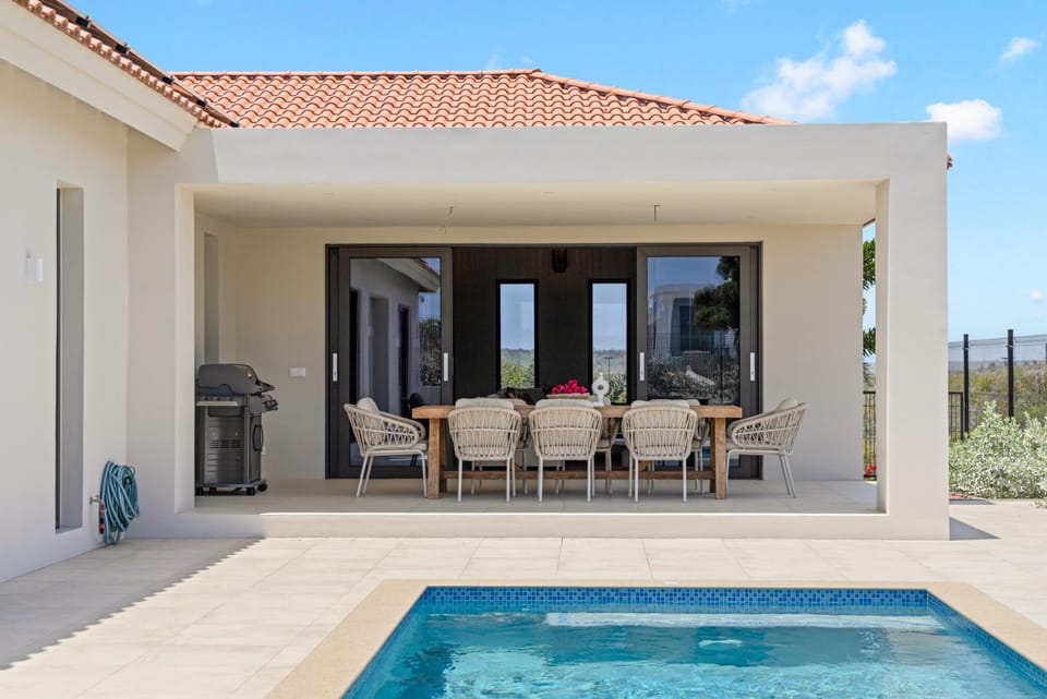 Patio, Seating area, Pool view, Swimming pool