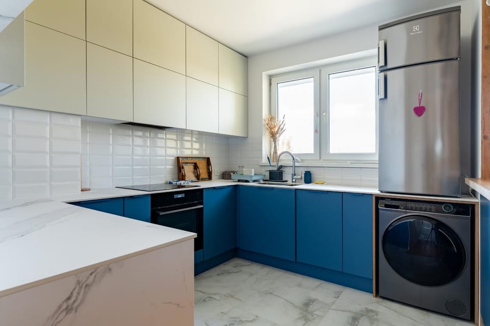 Kitchen or kitchenette, oven, stove, washing machine, dryer