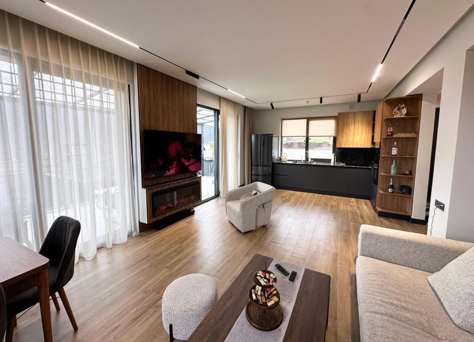 Kitchen or kitchenette, Living room, Seating area, Dining area