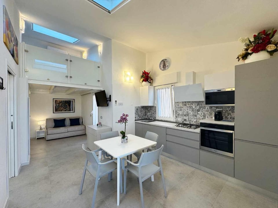 Kitchen or kitchenette, Living room, Dining area, dishwasher, oven, stove, toaster