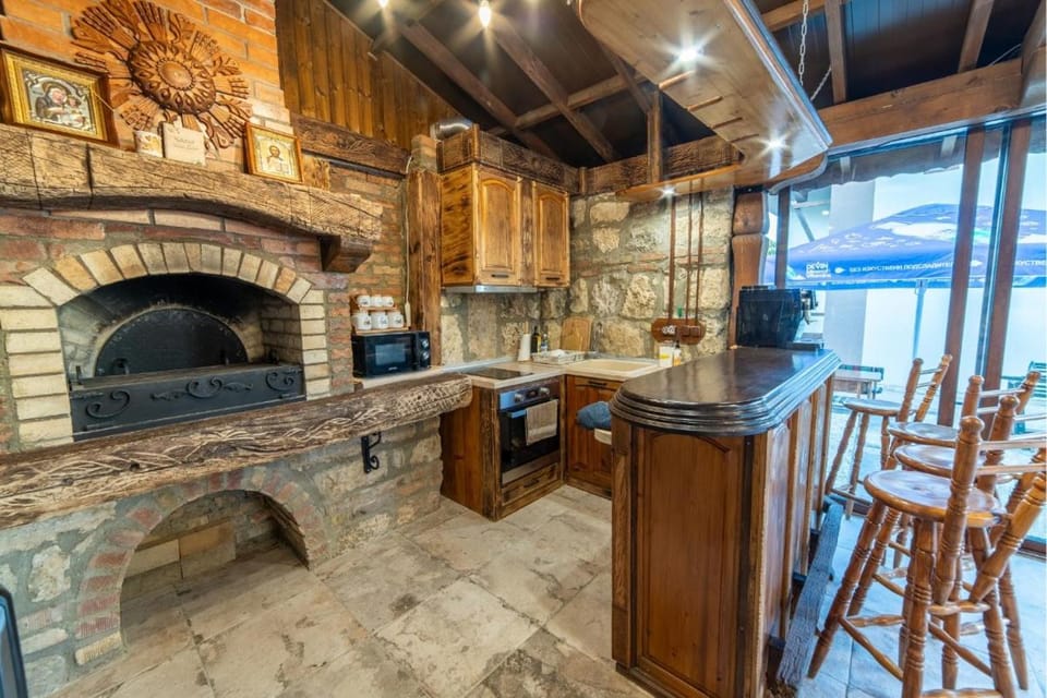Seating area, fireplace, stove, kitchen