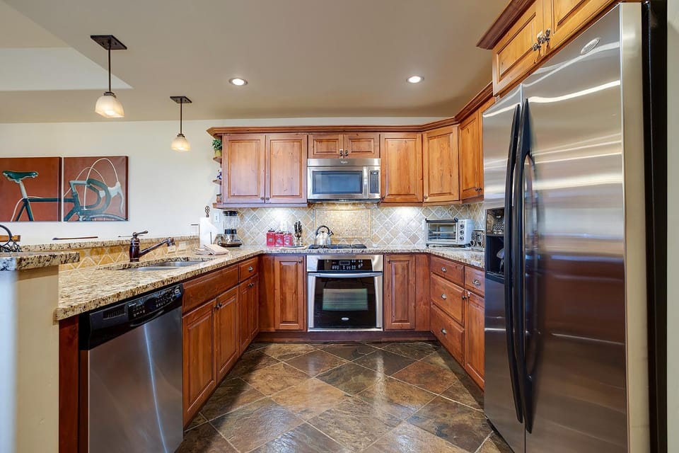 Kitchen or kitchenette, dishwasher, microwave, oven, stove, kitchen