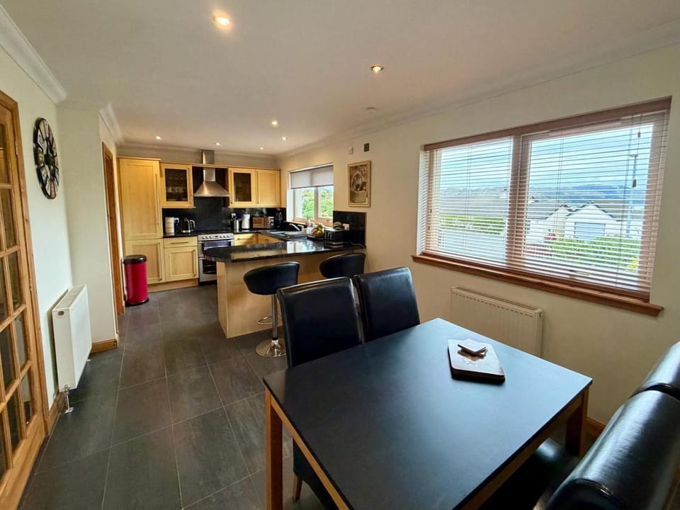 Dining area, dishwasher, stove, kitchen
