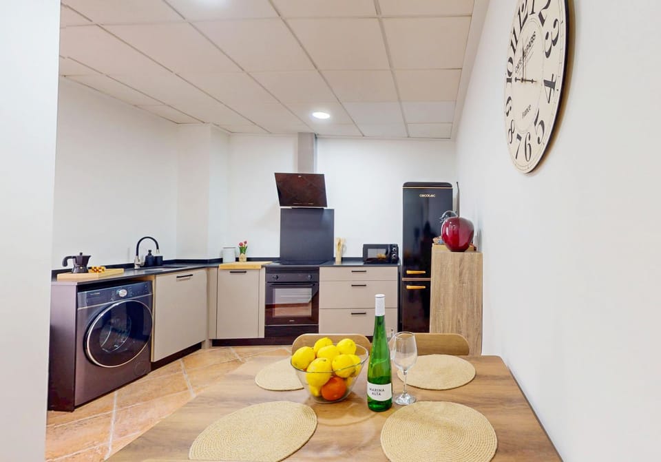 Kitchen or kitchenette, oven, stove, washing machine, kitchen
