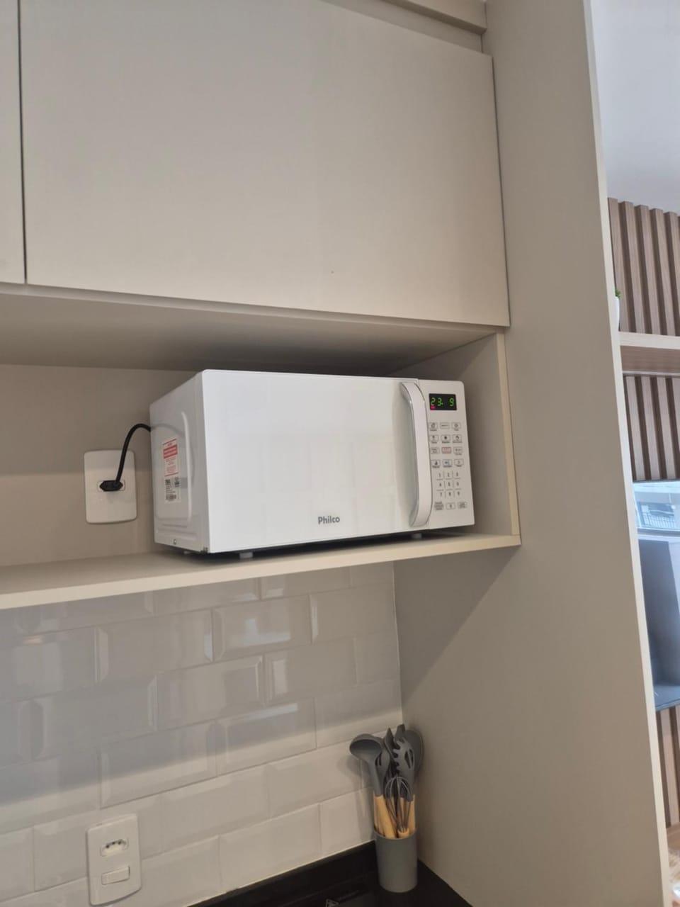 Kitchen or kitchenette, microwave
