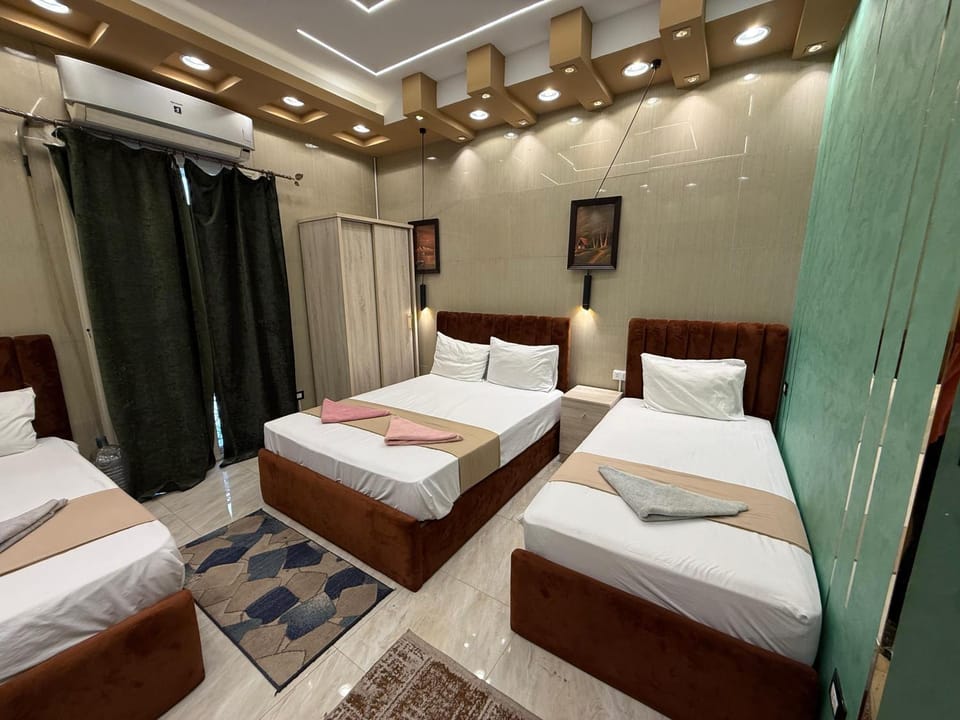 Bed, Photo of the whole room, Bedroom, towels, wardrobe, air conditioner