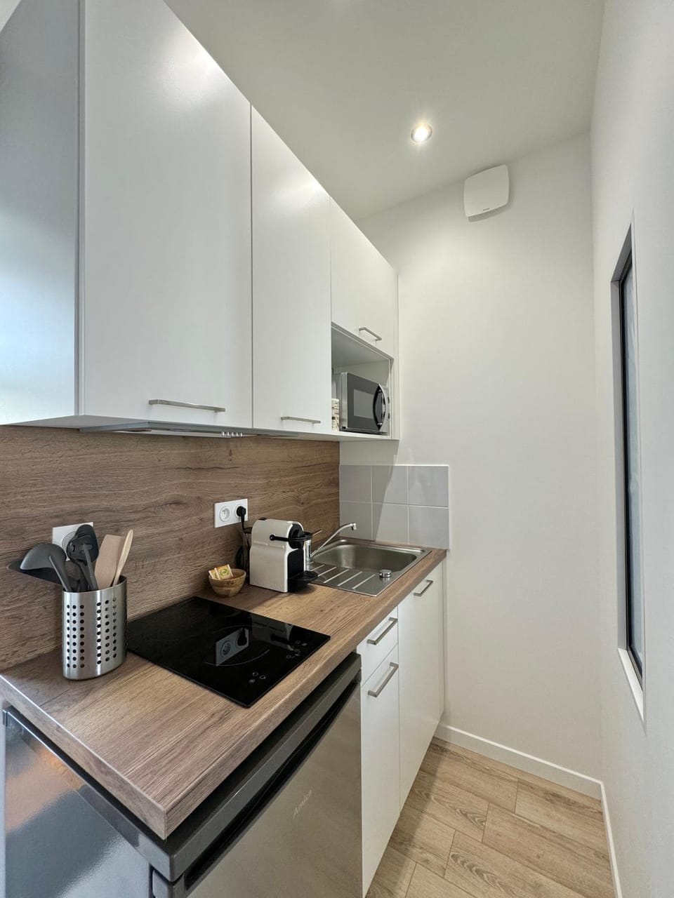 Kitchen or kitchenette, stove, toaster
