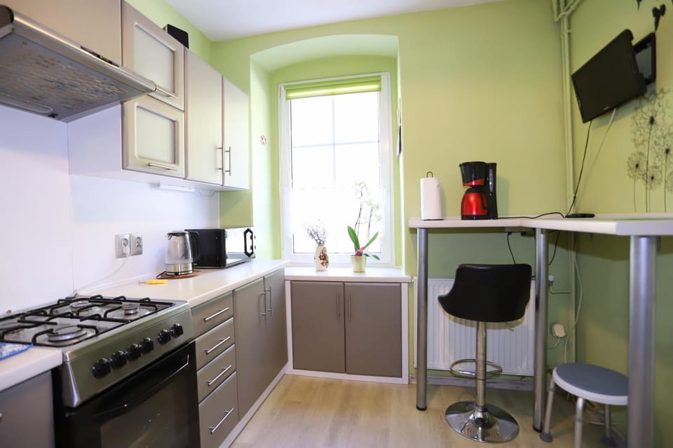 Kitchen or kitchenette, microwave, oven, stove, stove, kitchen, kitchen