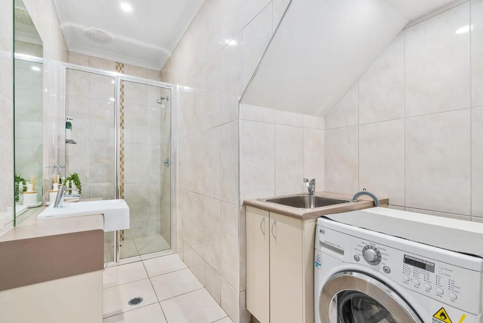 Shower, Bathroom, towels, washing machine, dryer