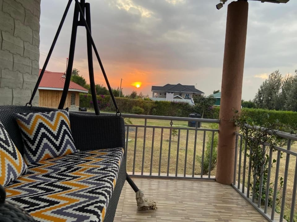 Natural landscape, View (from property/room), Balcony/Terrace, Balcony/Terrace, Seating area, Sunset