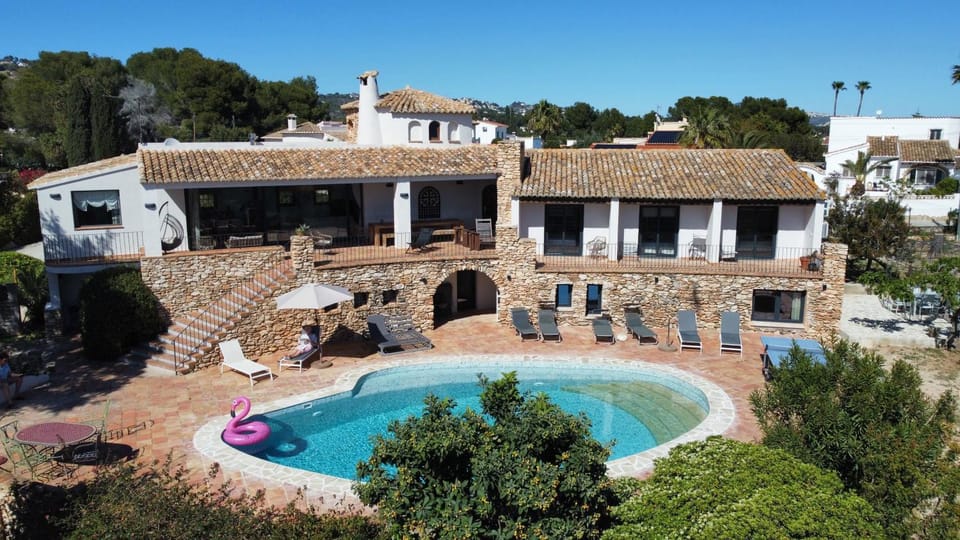 Property building, Living room, Swimming pool